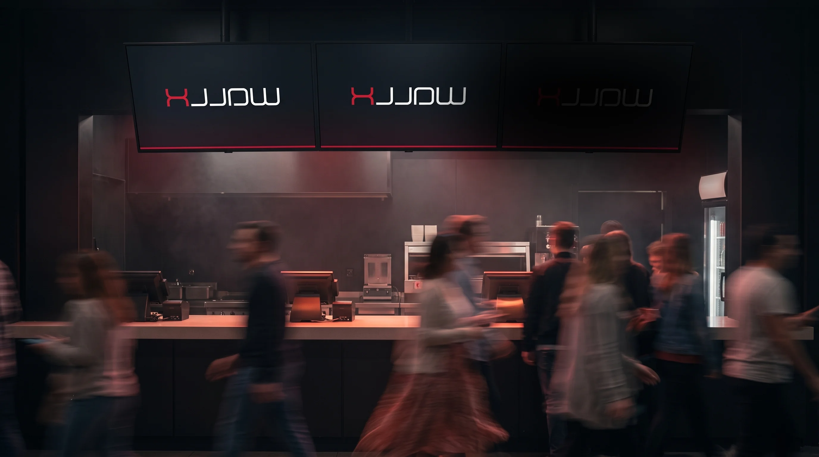 Three digital menu boards above a dark counter, each showing the Wallx logo, while customers pass by as long-exposure motion trails